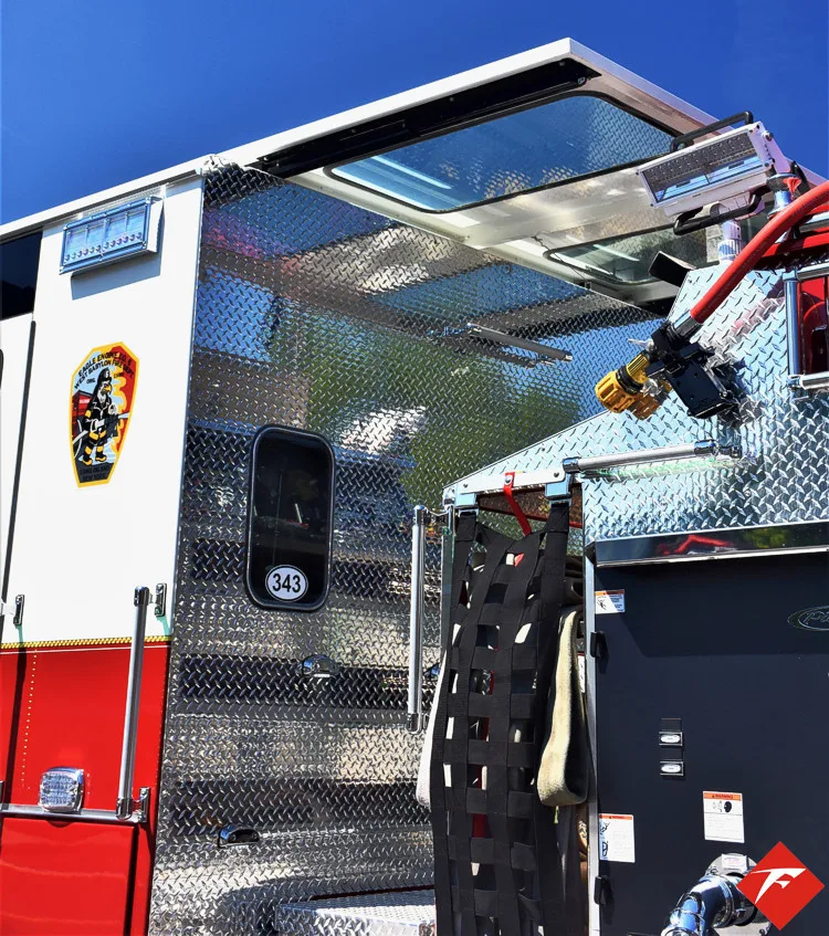 Rear crew-cab side view with open access panel and interior storage