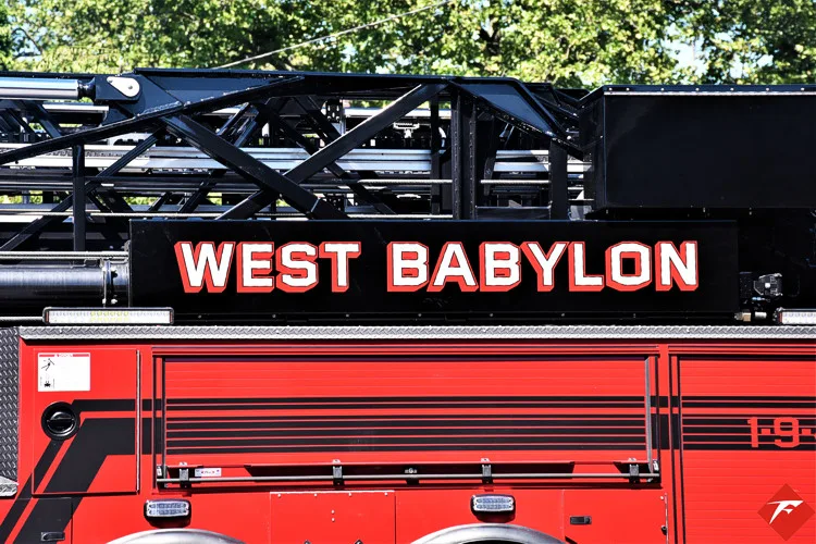 Side lettering close-up showing West Babylon text on ladder beam