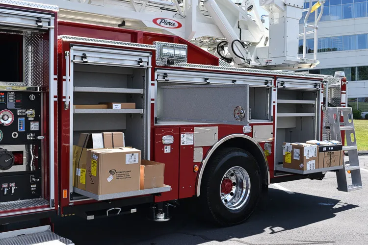 Rear-left profile showing side body and open compartment near rear wheel