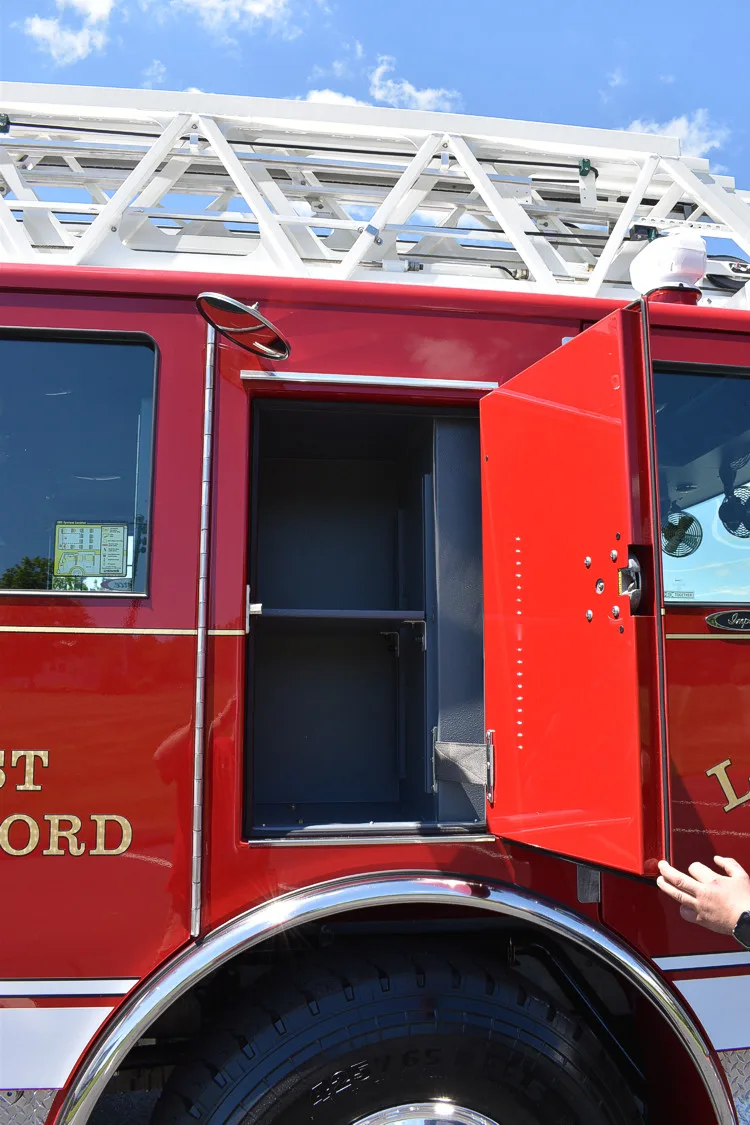 Rear wheel and side panel close-up showing fender trim and body curve