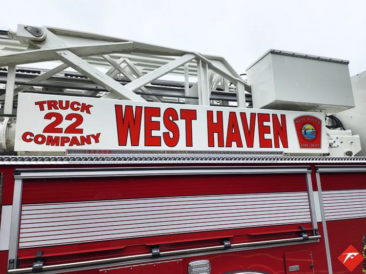 Body side lettering close-up showing truck company number and West Haven text