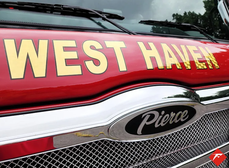 Front grille close-up showing West Haven script and Pierce badge