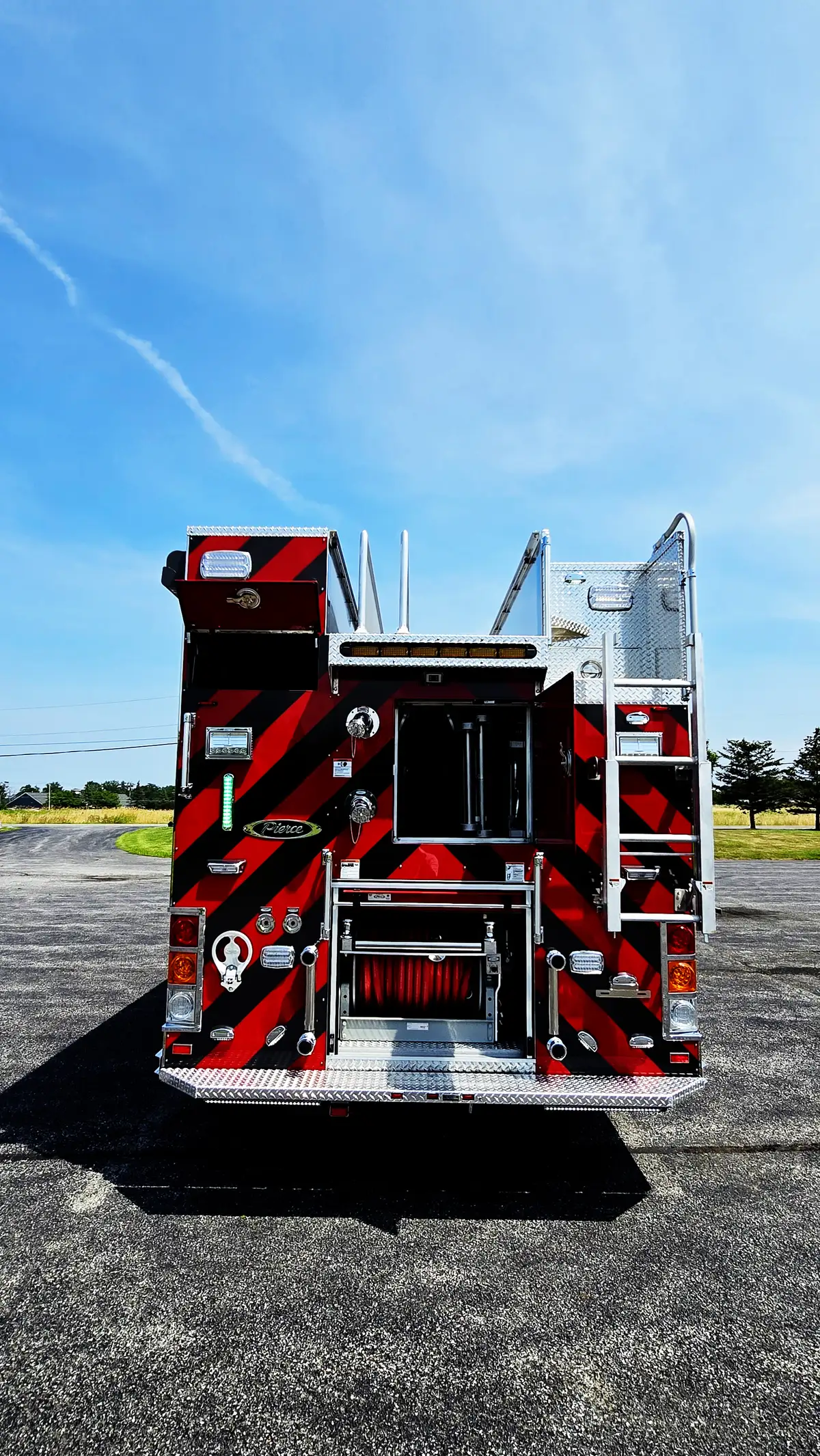 Rear view showing chevrons, rear lights, and open center compartment