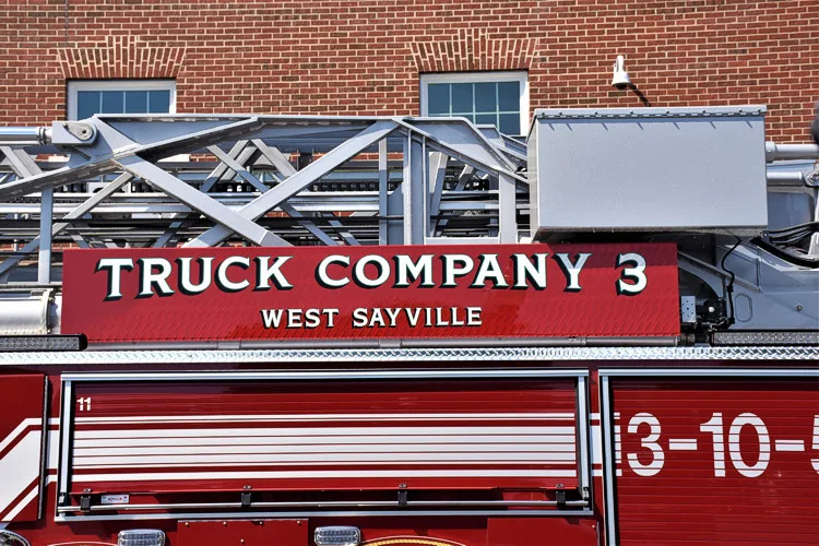 Body side lettering close-up showing truck company designation
