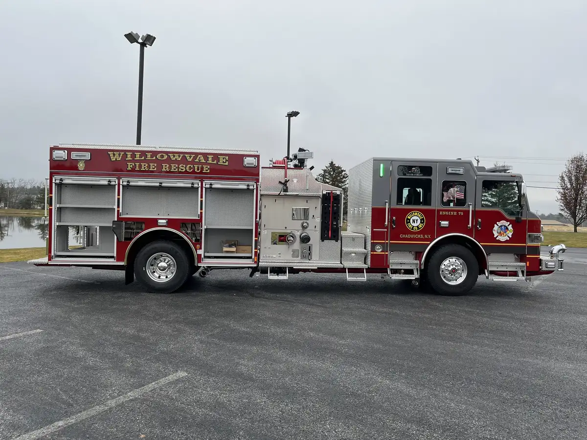 Officer-side full profile view showing open side compartments and pump controls