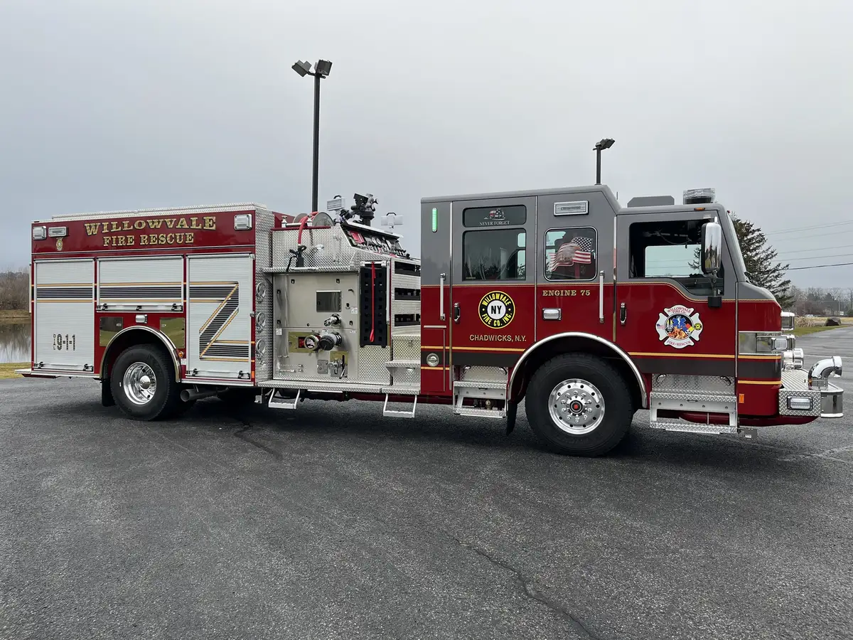 Officer-side profile view showing side pump panel and open rear compartment