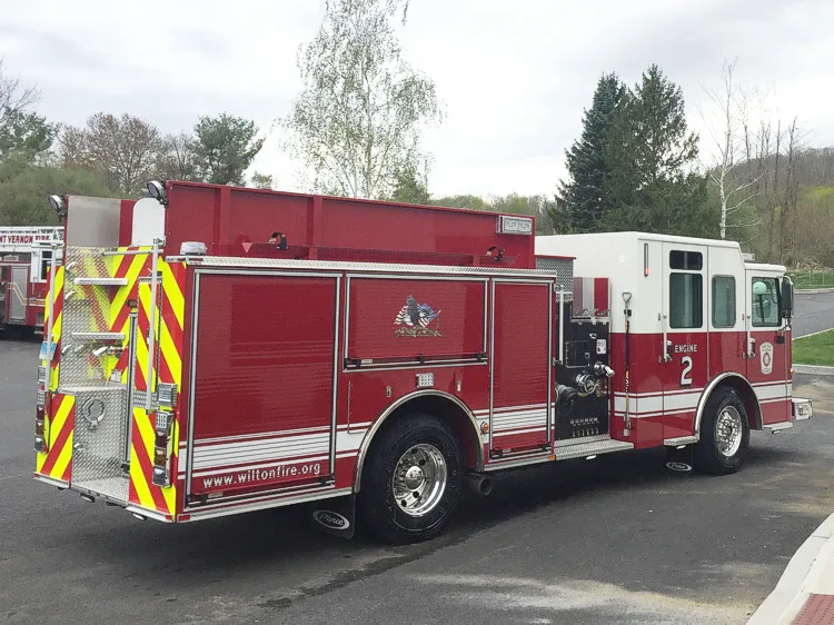 Rear right side view showing side compartments, rear chevron panel, and back step area.