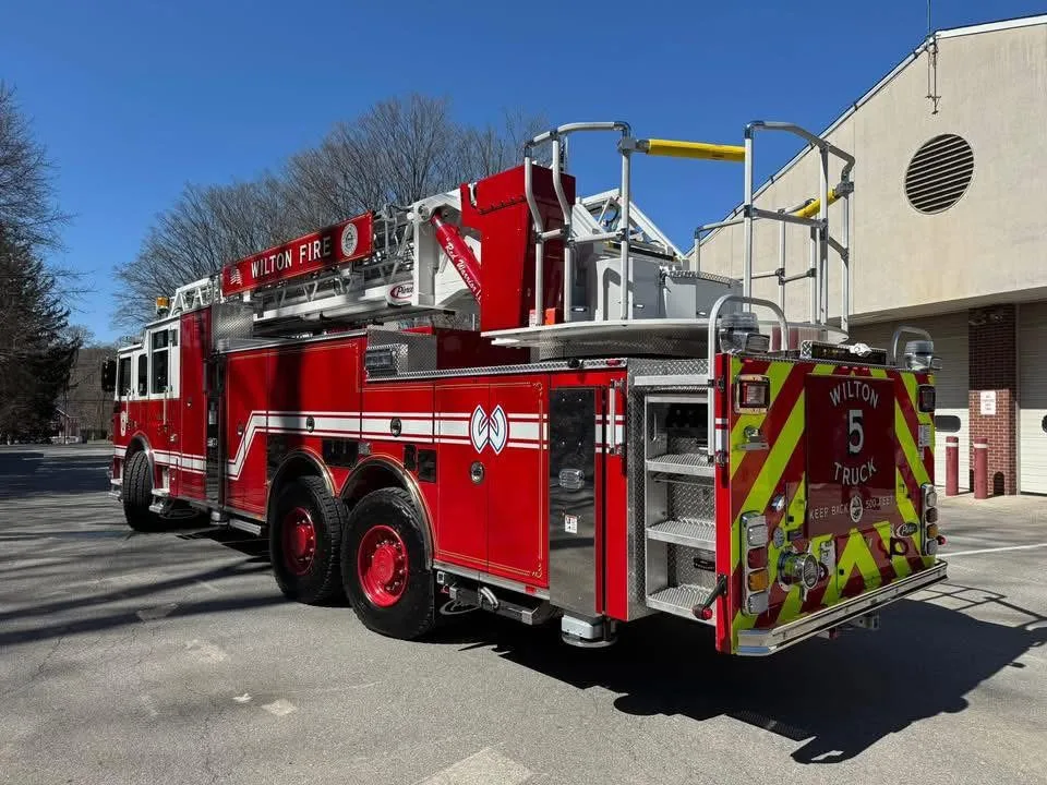 Rear-left exterior view showing side body and rear chevrons