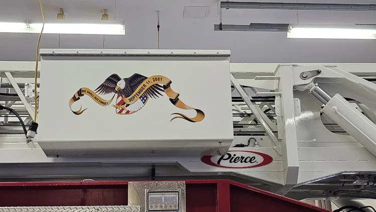 Ladder beam close-up showing eagle graphic and aerial section details