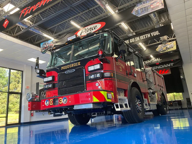 Rear-right exterior view showing side body and rear compartment section