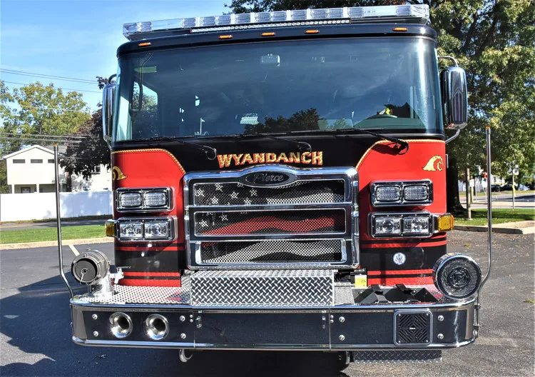 Head-on front view showing grille and bumper intake from right angle