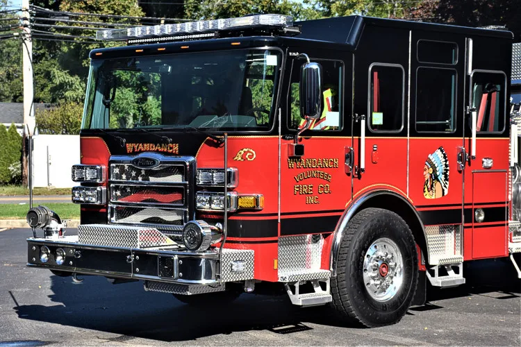 Pumper front-left exterior profile showing side body and front wheel