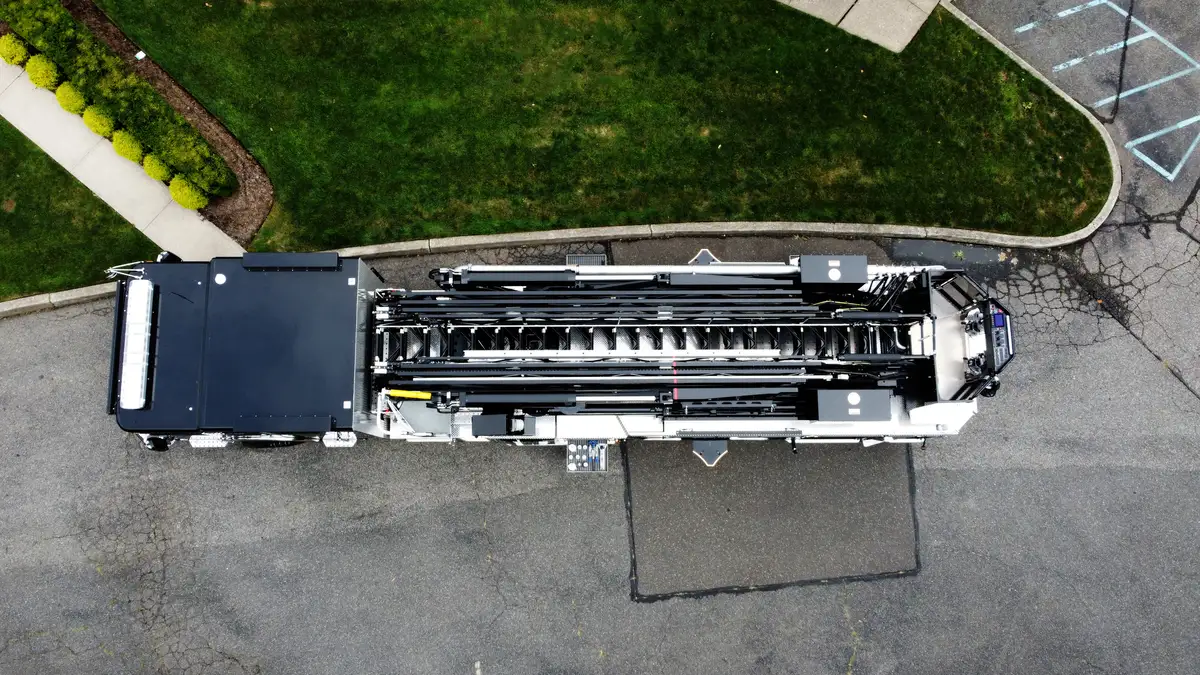 Aerial top-down rear view showing rear body deck and ladder base area