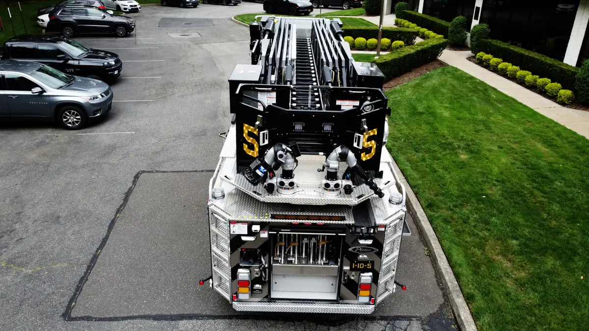 Aerial top-down side view showing ladder bed and compartment arrangement