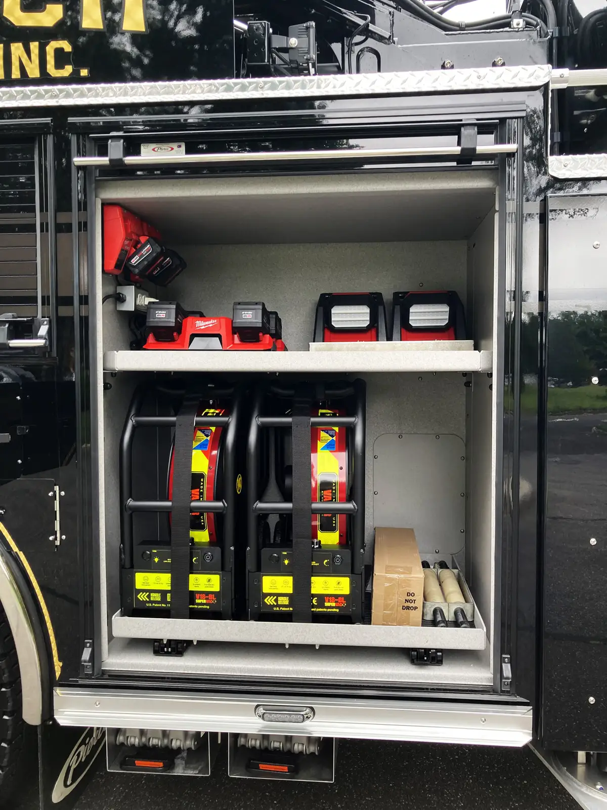 Front intake cap close-up showing chrome coupling and chain tether