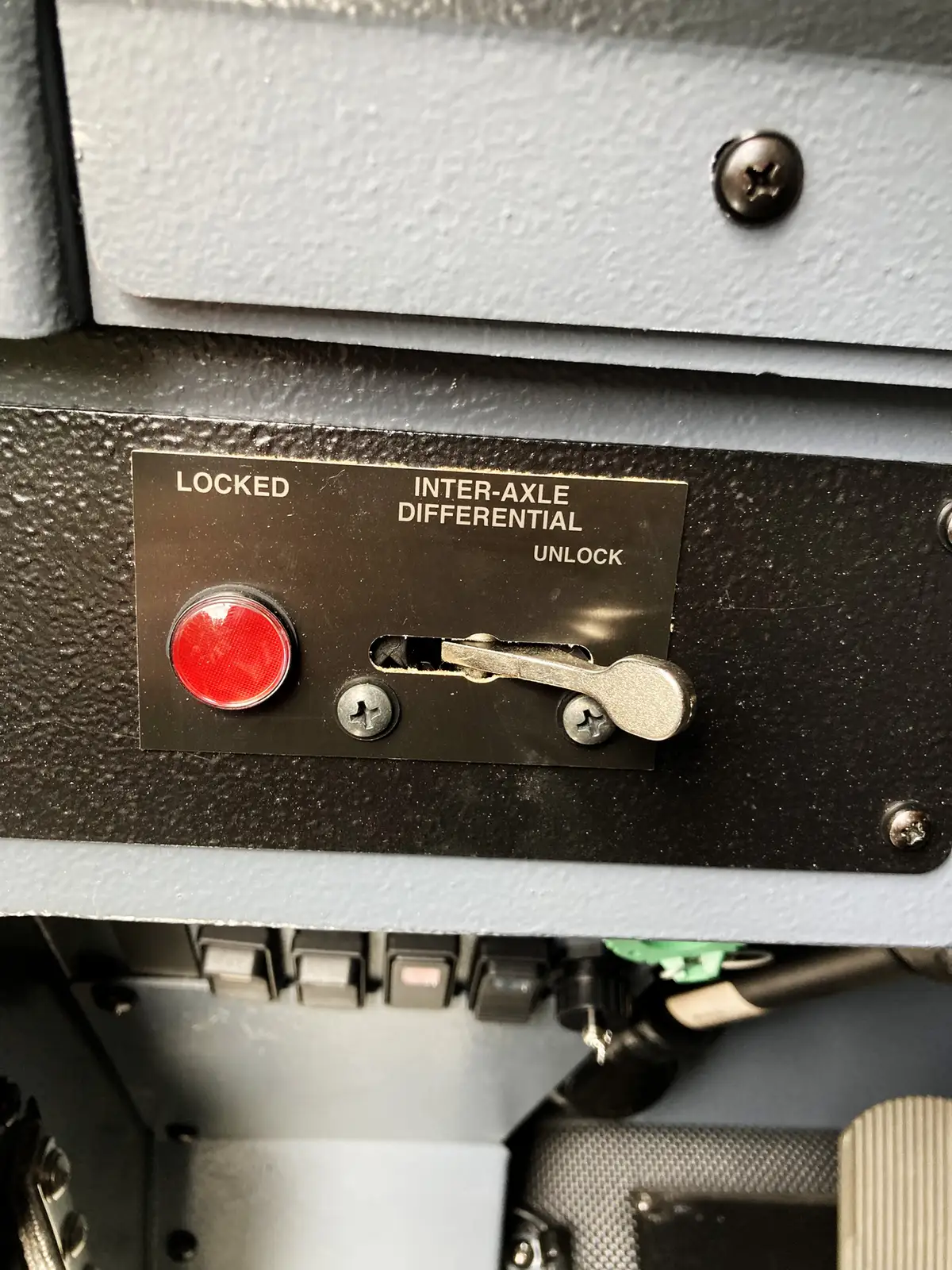 Cab interior view showing dashboard, center controls, and front windshield