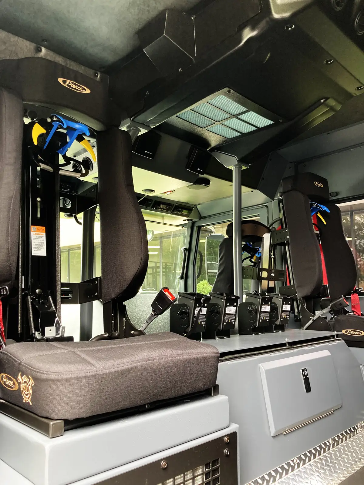 Cab side-view mirror close-up with reflective housing